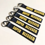 SUPER BLESSED Gold on Black Wrist strap keychain